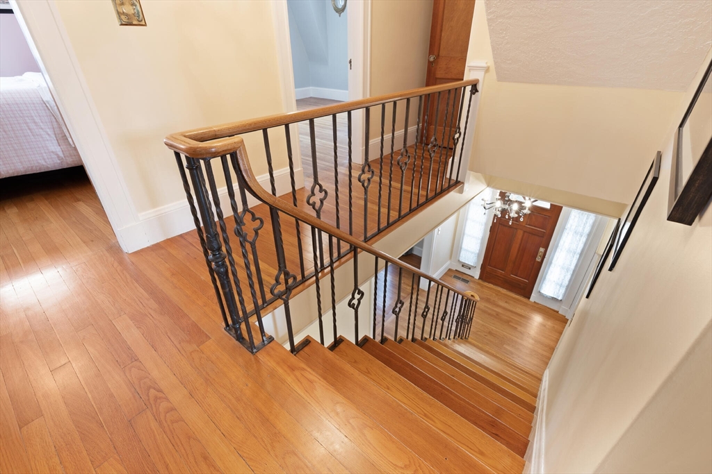 177 Nevada Street Newton, MA 02460 - Photo 10 of 40 a view of entryway with wooden floor