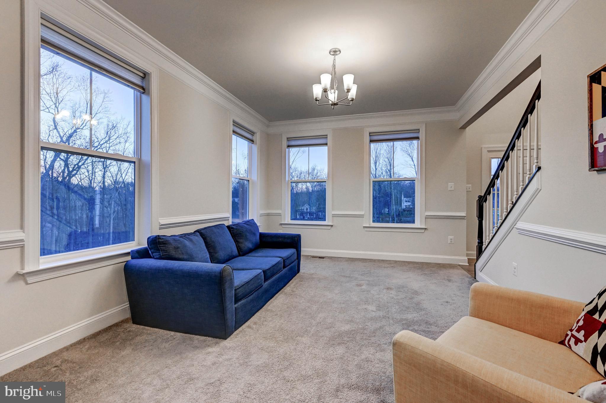 2613 Cotter Road Manchester, MD 21102 - Photo 11 of 26 a living room with furniture and a chandelier