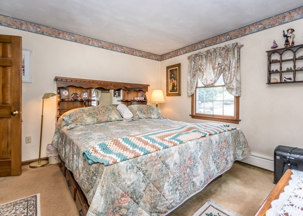 35 Woodchester Road Waltham, MA 02451 - Photo 13 of 39 a bedroom with a bed and a window