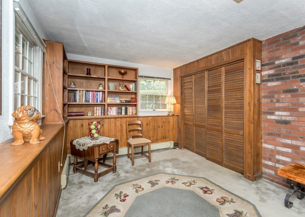 35 Woodchester Road Waltham, MA 02451 - Photo 19 of 39 a reading room with furniture window and book shelf