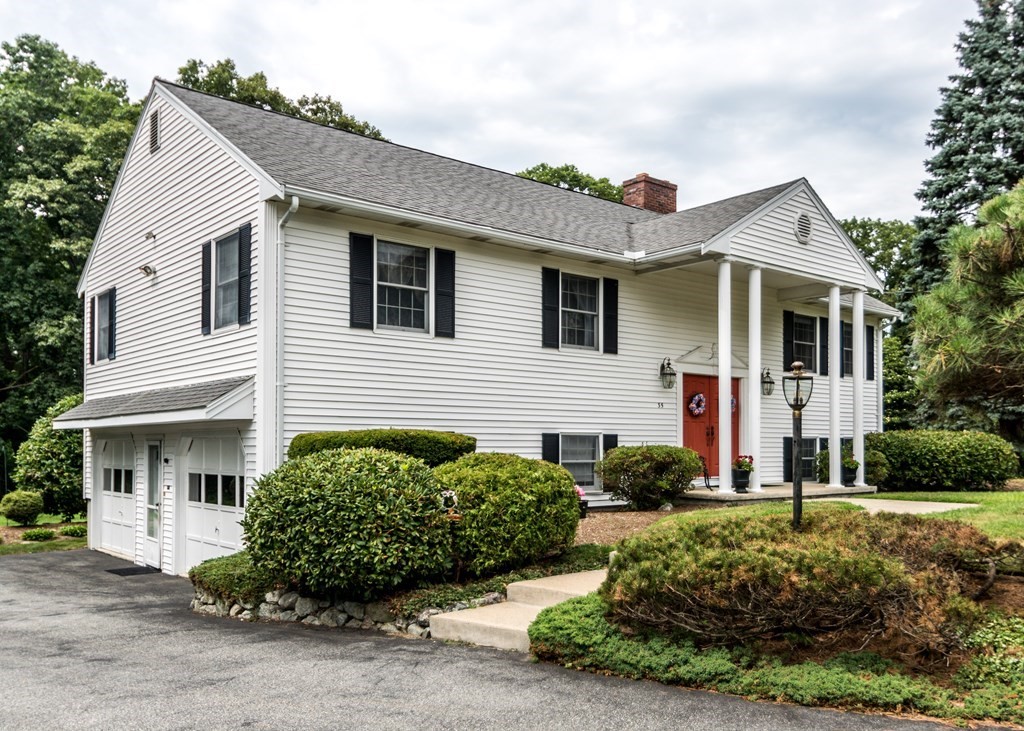 35 Woodchester Road Waltham, MA 02451 - Photo 2 of 39 a front view of a house with garden