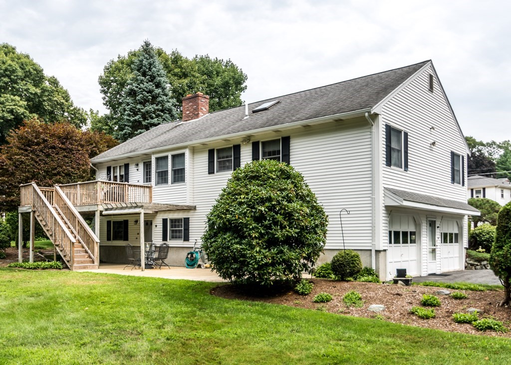 35 Woodchester Road Waltham, MA 02451 - Photo 27 of 39 a front view of a house with a yard
