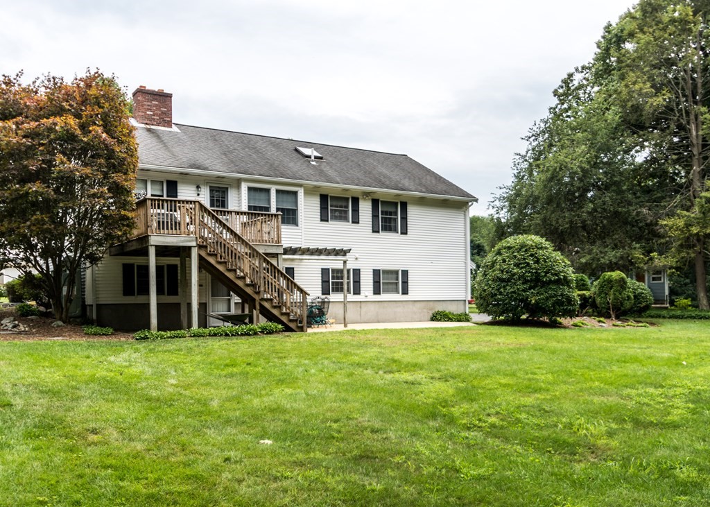 35 Woodchester Road Waltham, MA 02451 - Photo 28 of 39 a view of a house with a yard