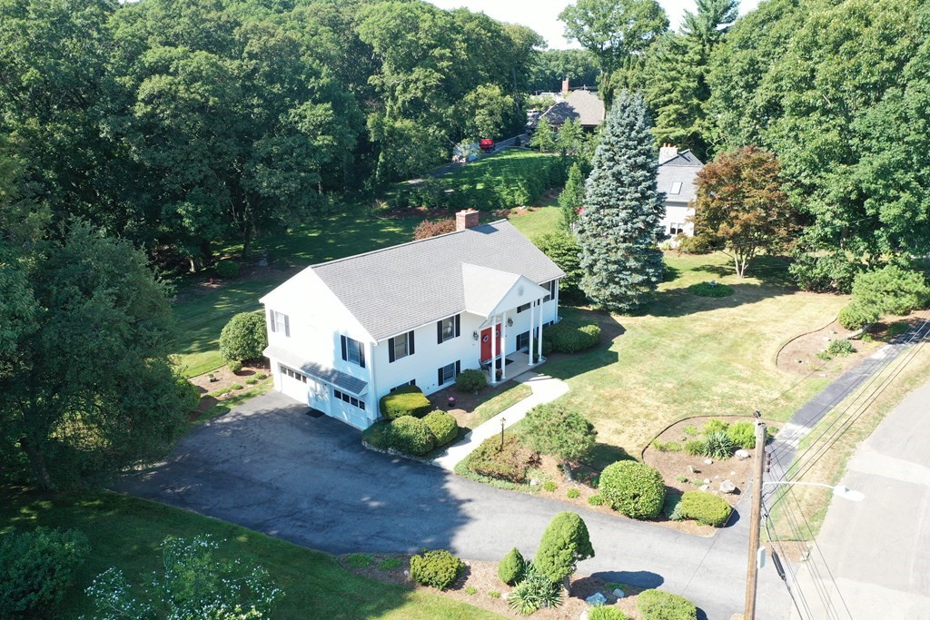 35 Woodchester Road Waltham, MA 02451 - Photo 35 of 39 an aerial view of a house with a yard and large trees