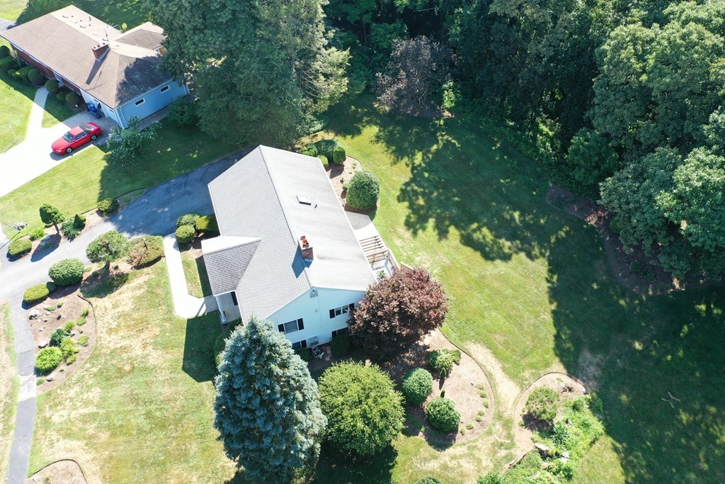 35 Woodchester Road Waltham, MA 02451 - Photo 36 of 39 an aerial view of a house with a yard and garden