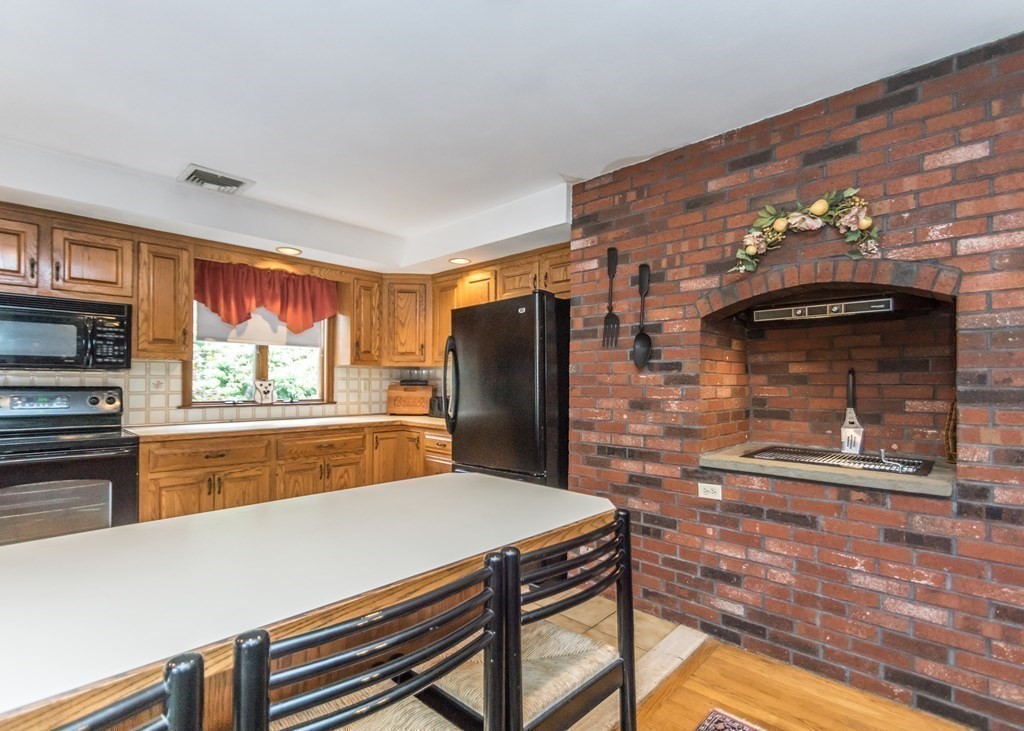 35 Woodchester Road Waltham, MA 02451 - Photo 7 of 39 a view of a dining room with furniture window and outside view