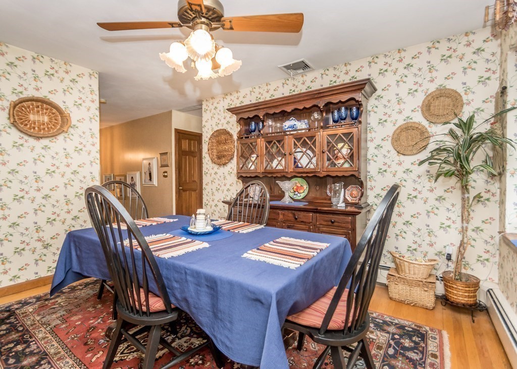35 Woodchester Road Waltham, MA 02451 - Photo 9 of 39 a view of a dining room with furniture and chandelier
