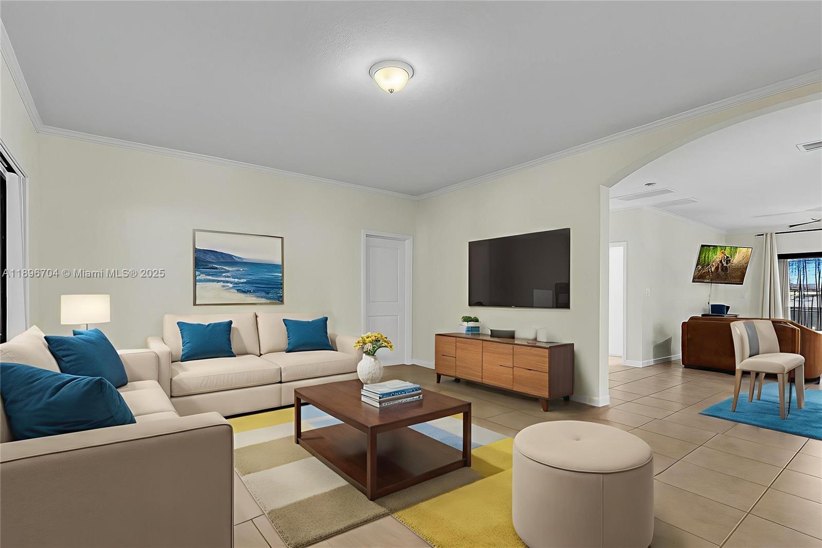 27109 Southwest 133rd Court Homestead, FL 33032 - Photo 15 of 48 a living room with furniture and a flat screen tv