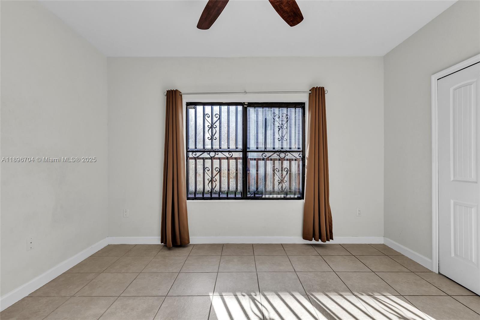 27109 Southwest 133rd Court Homestead, FL 33032 - Photo 25 of 48 a view of entryway with window