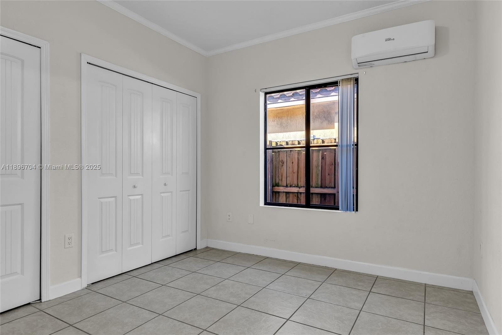 27109 Southwest 133rd Court Homestead, FL 33032 - Photo 34 of 48 an empty room with windows