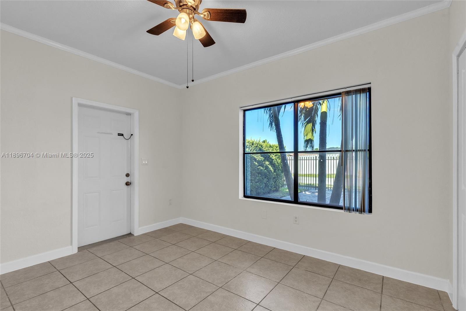 27109 Southwest 133rd Court Homestead, FL 33032 - Photo 38 of 48 a view of an empty room with a window