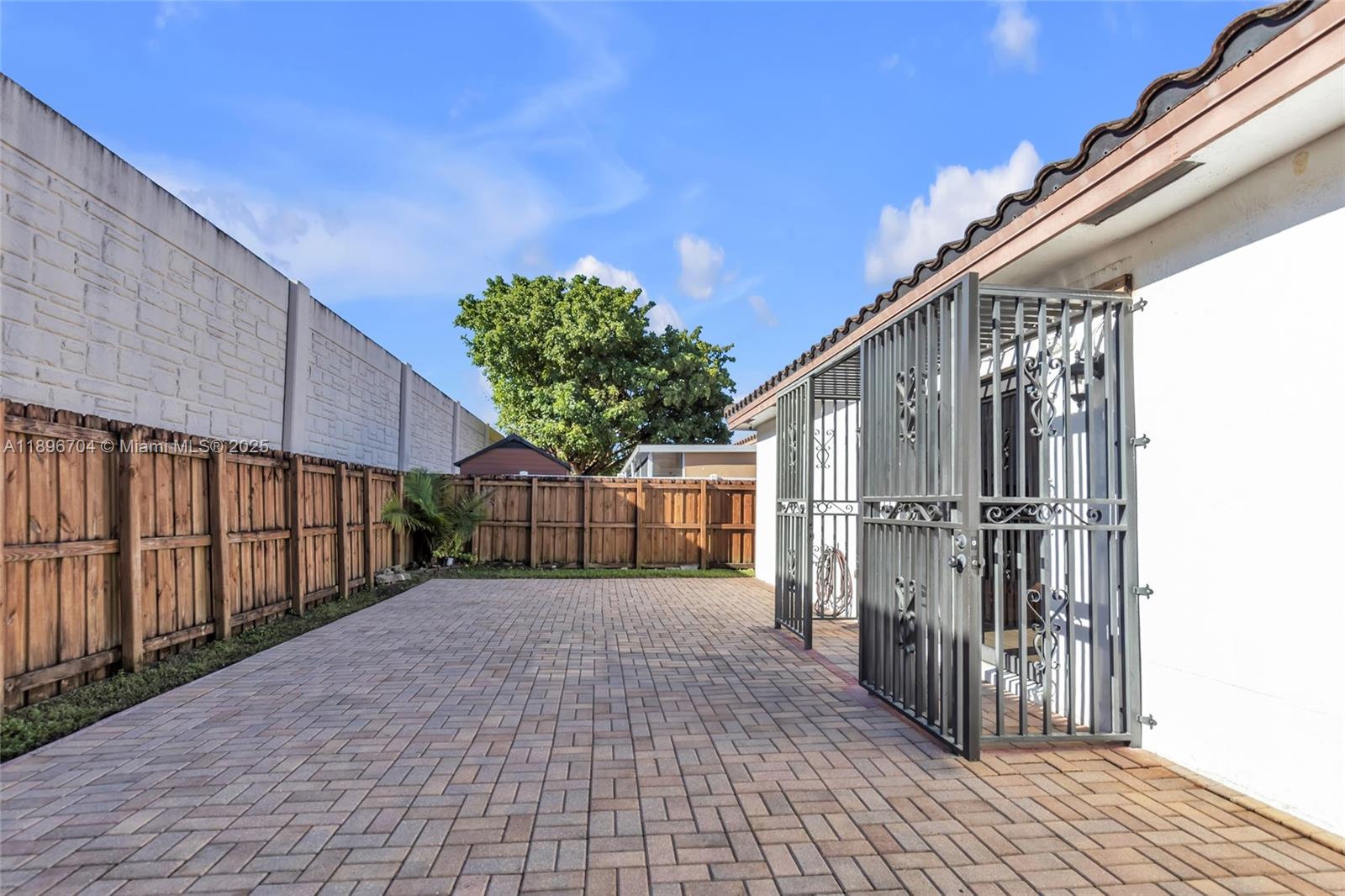 27109 Southwest 133rd Court Homestead, FL 33032 - Photo 45 of 48 a view of a house with a backyard