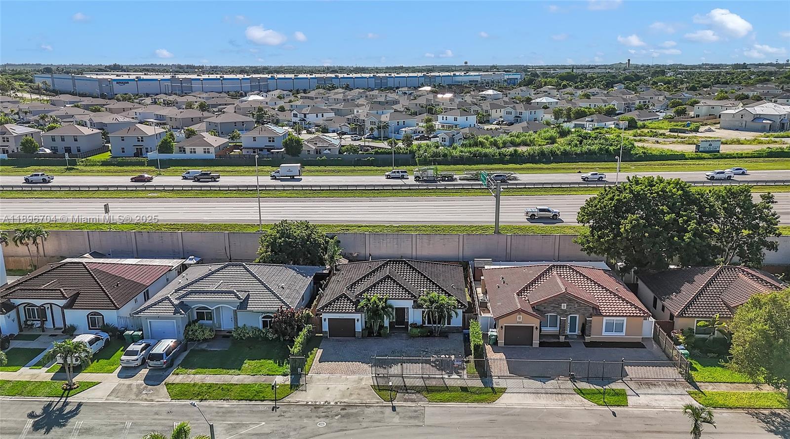 27109 Southwest 133rd Court Homestead, FL 33032 - Photo 47 of 48 an aerial view of a house with a yard