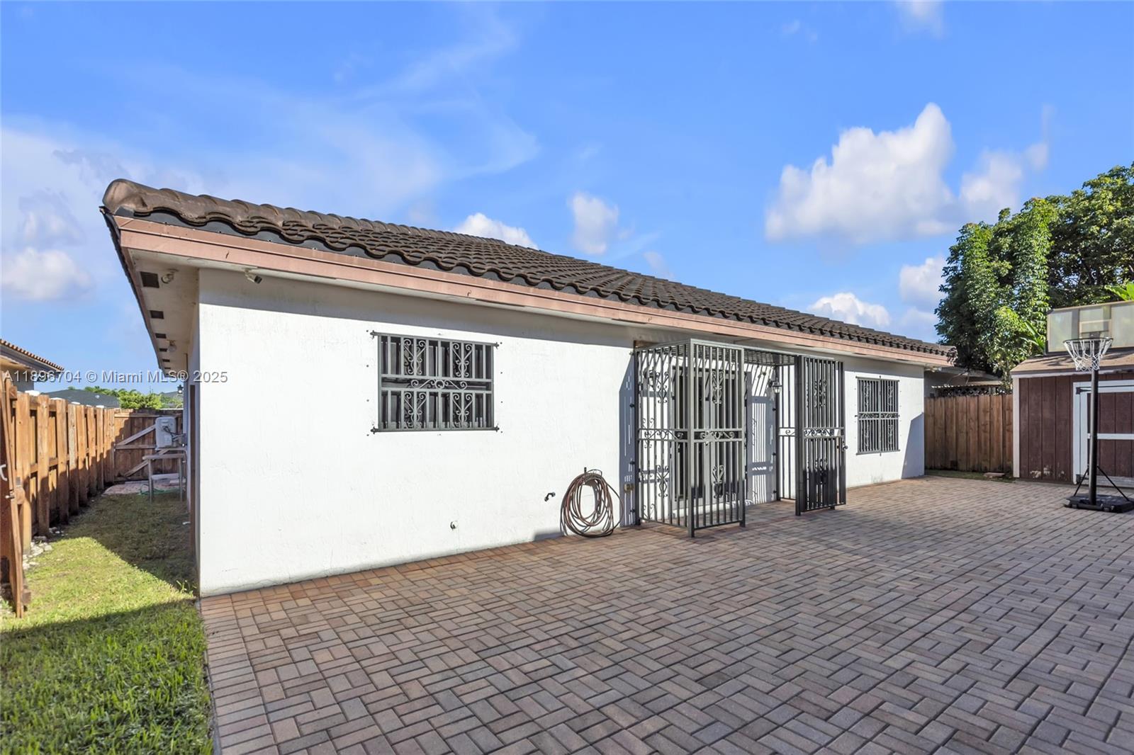 27109 Southwest 133rd Court Homestead, FL 33032 - Photo 7 of 48 a front view of a house with a yard