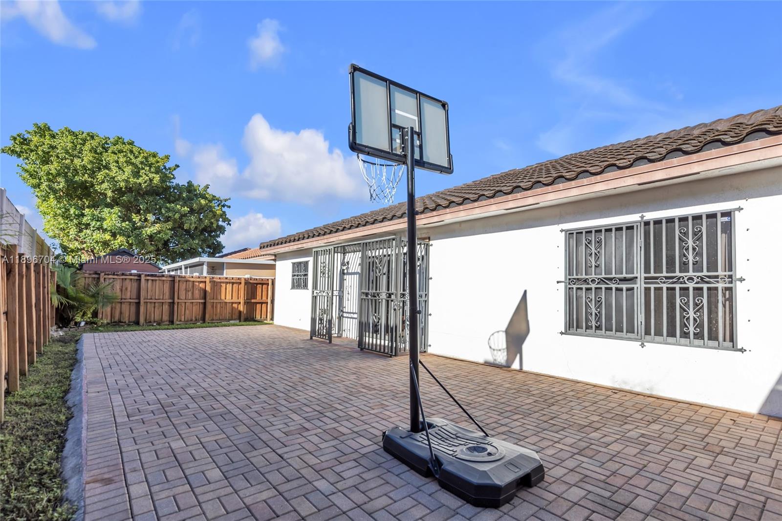 27109 Southwest 133rd Court Homestead, FL 33032 - Photo 8 of 48 a front view of a house with a yard