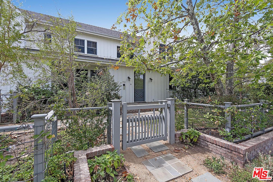 a deck view with a garden