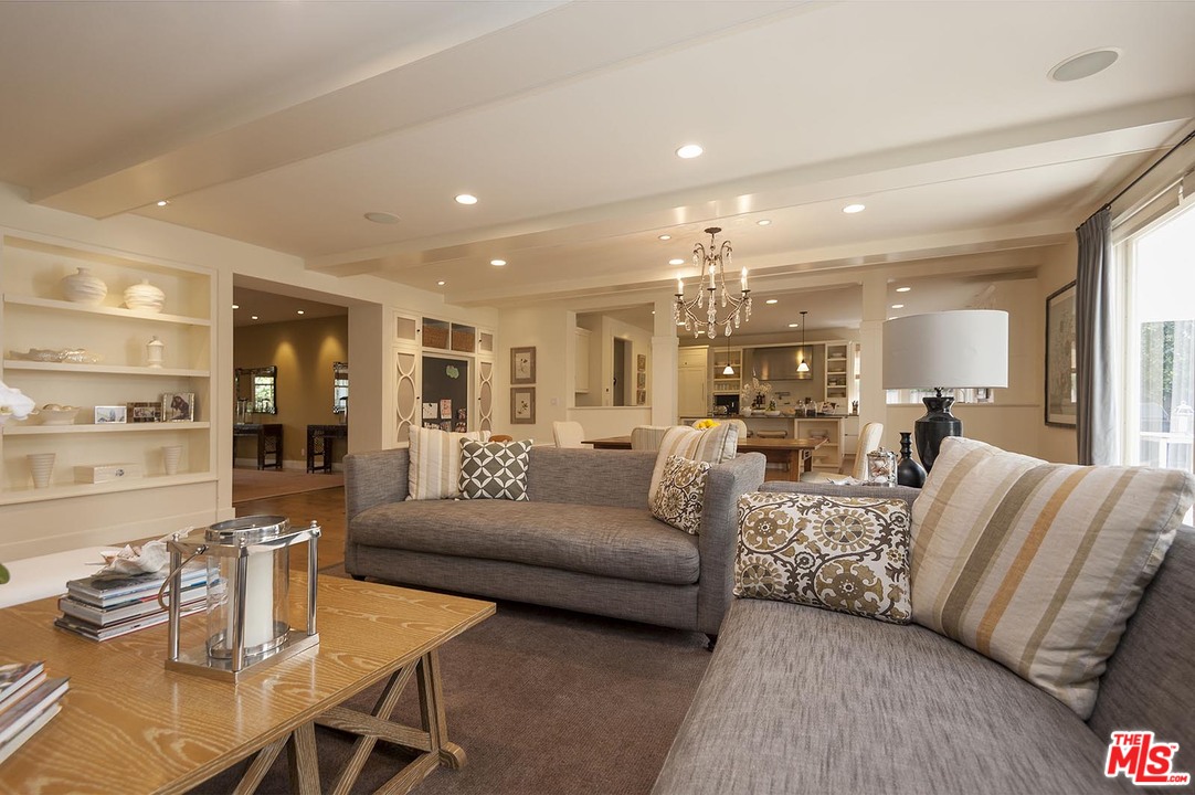 753 Ocampo Drive Pacific Palisades, CA 90272 - Photo 16 of 53 a living room with furniture kitchen and a table