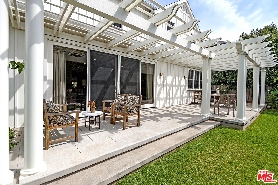 753 Ocampo Drive Pacific Palisades, CA 90272 - Photo 51 of 53 a view of a house with backyard and porch
