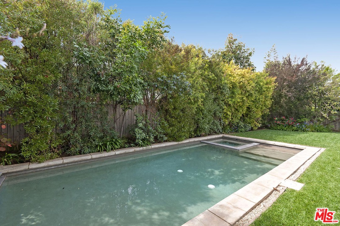 753 Ocampo Drive Pacific Palisades, CA 90272 - Photo 52 of 53 a view of a swimming pool with a yard