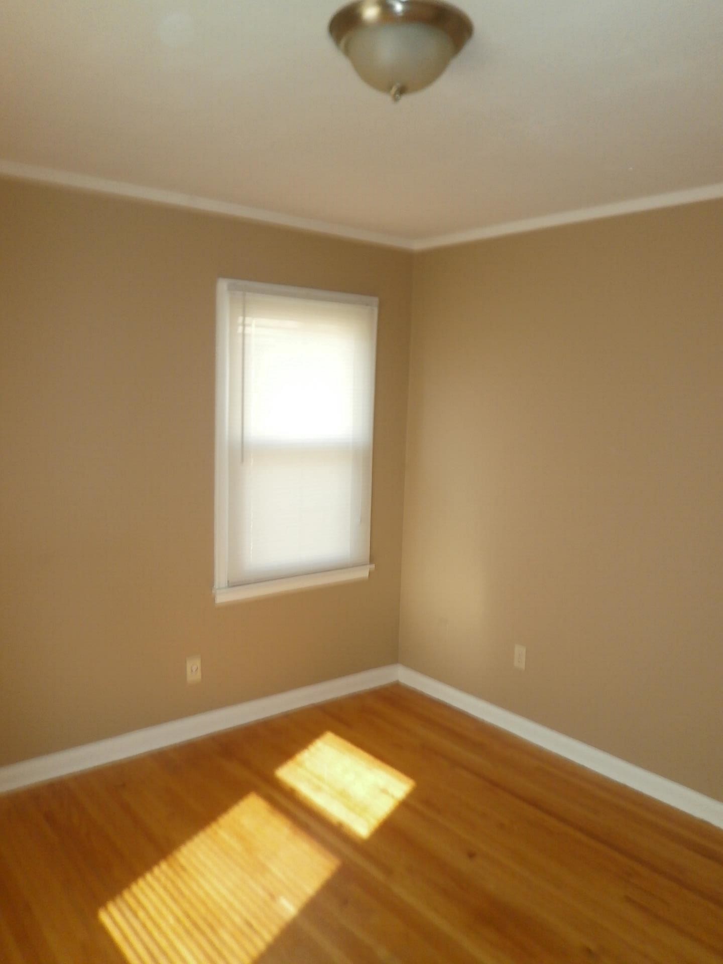 1458 Dearing Road Memphis, TN 38117 - Photo 8 of 11 a view of an empty room and window