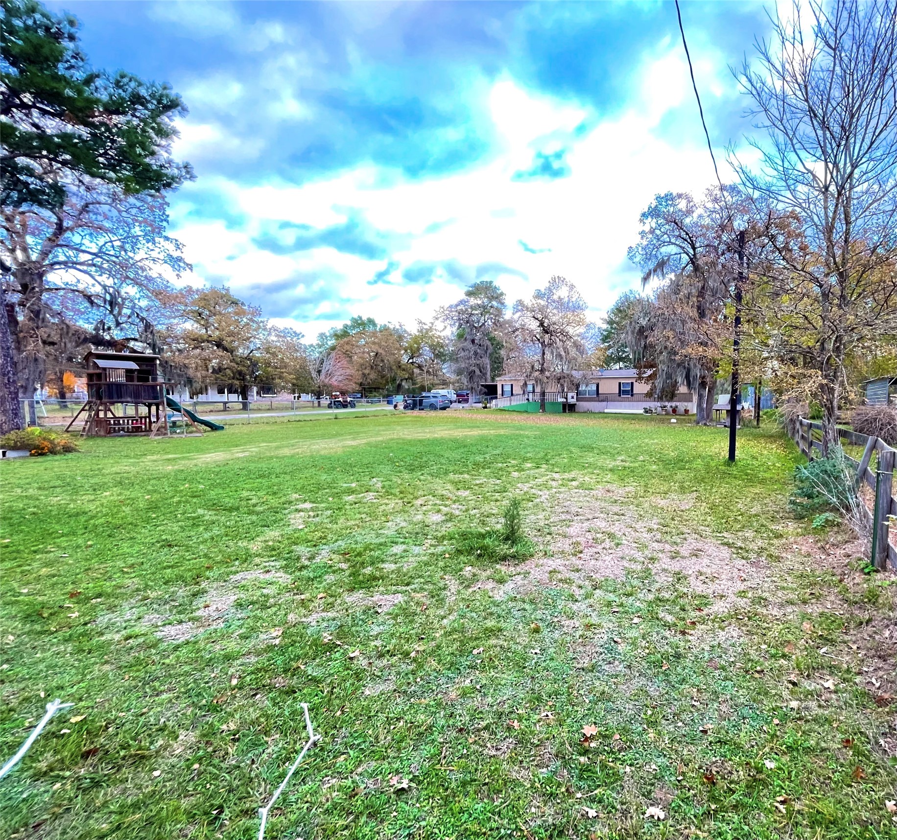 23719 Saxon Way Hockley, TX 77447 - Photo 5 of 22 a view of a field of grass and trees