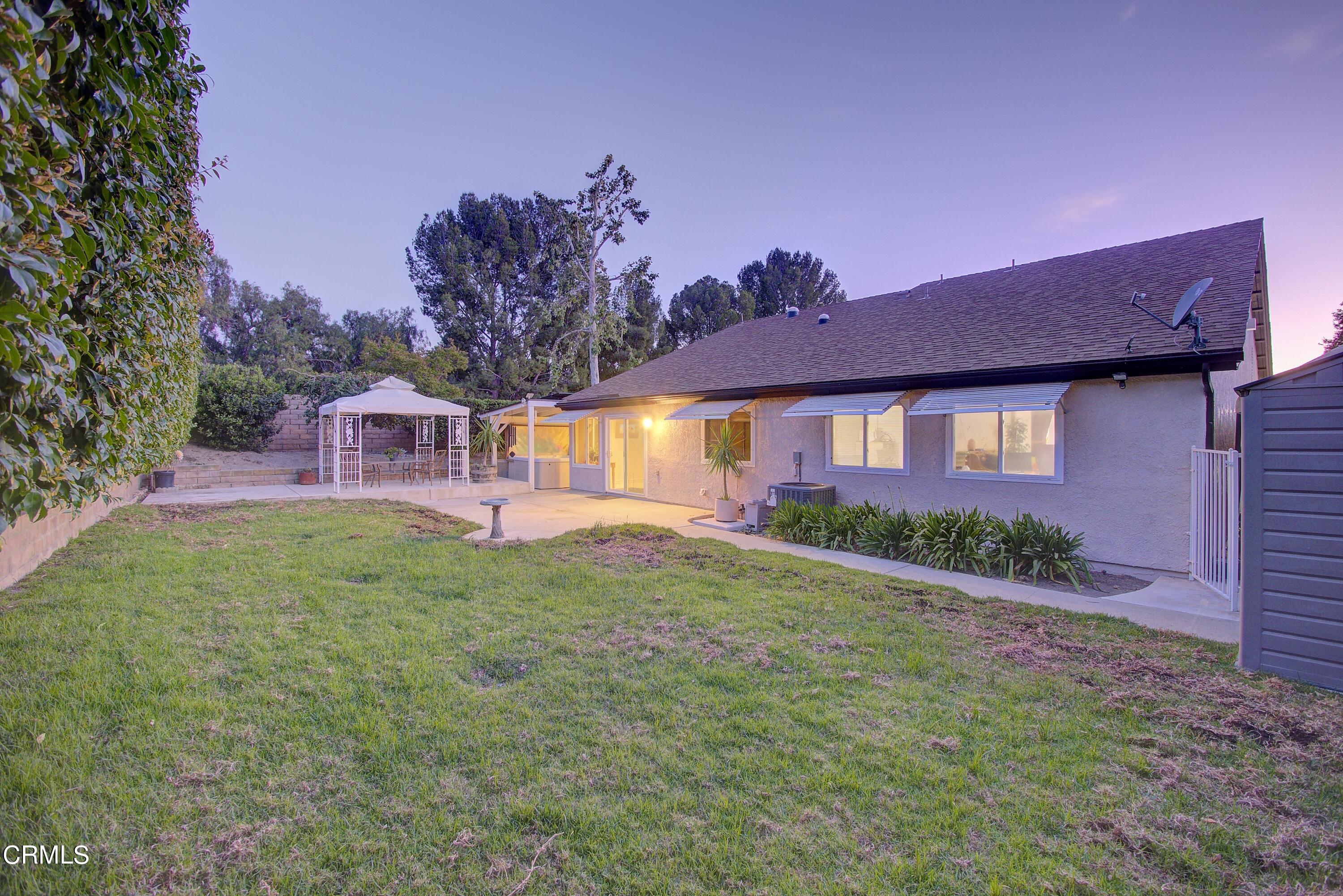 2606 Wheatfield Circle Simi Valley, CA 93063 - Photo 21 of 60 a view of a house with a backyard