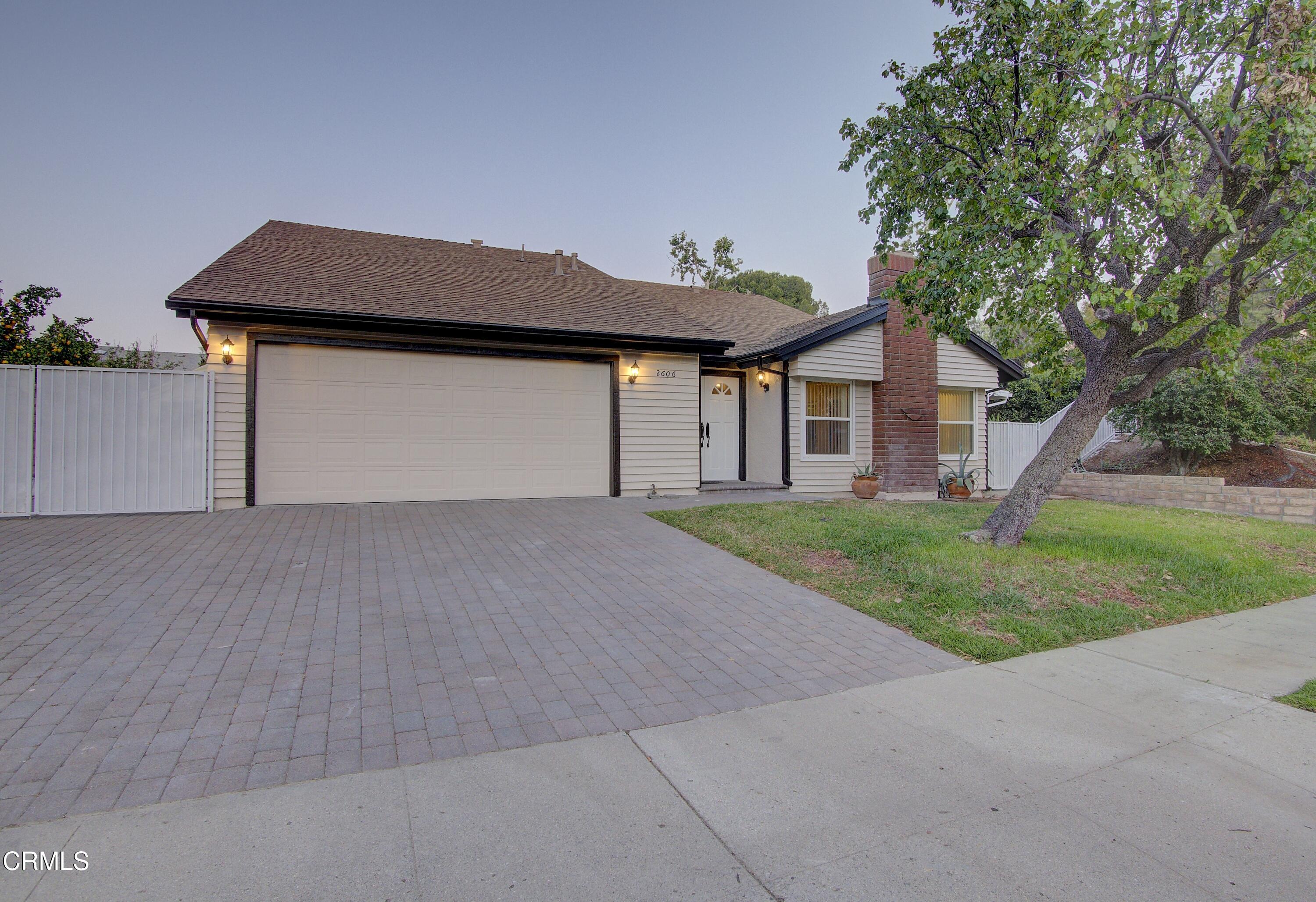 2606 Wheatfield Circle Simi Valley, CA 93063 - Photo 4 of 60 a front view of house with yard and green space
