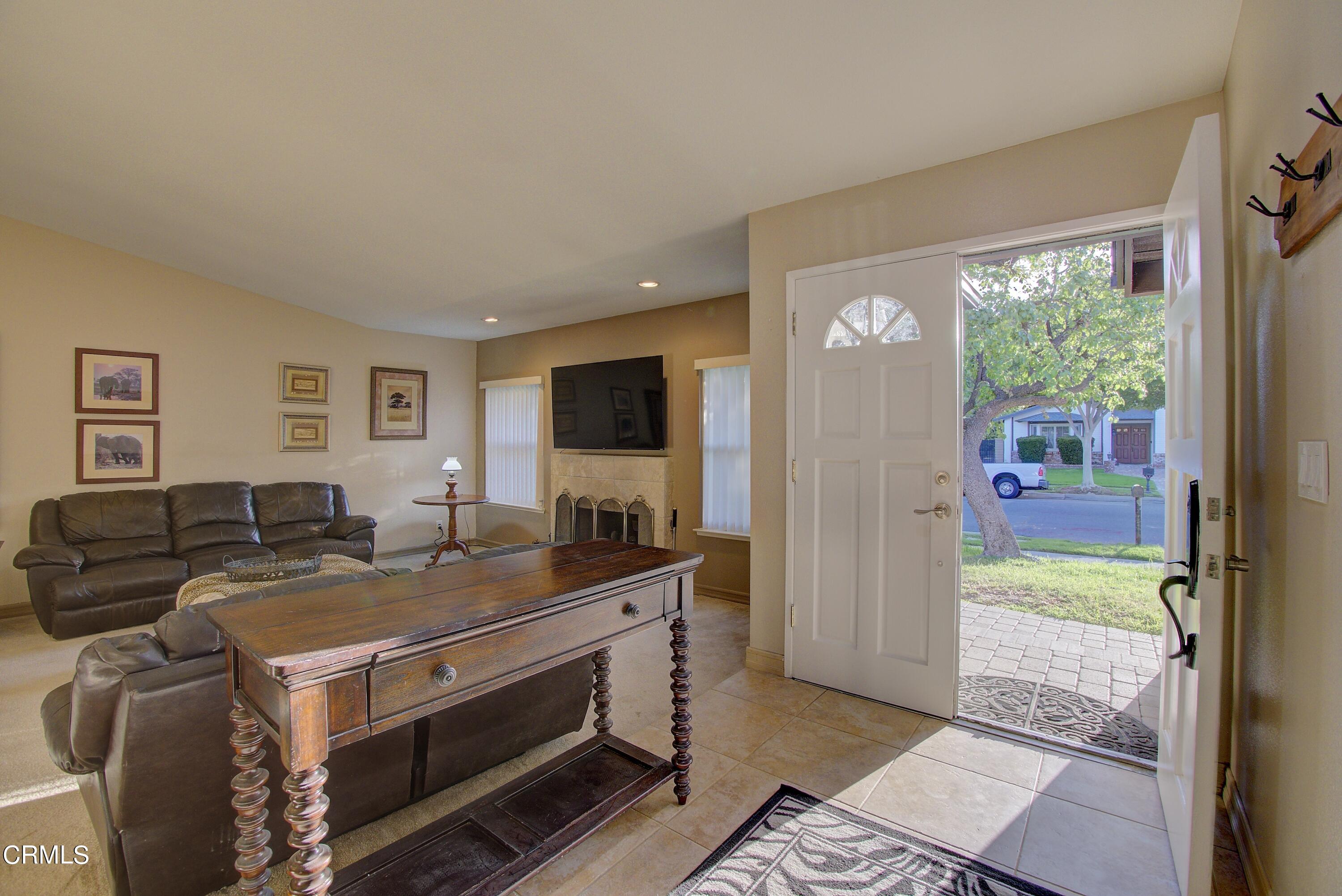 2606 Wheatfield Circle Simi Valley, CA 93063 - Photo 42 of 60 a view of kitchen island with stainless steel appliances granite countertop sink and cabinets