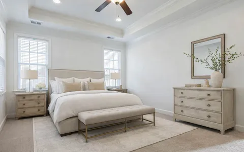 a bath tub sitting next to a window