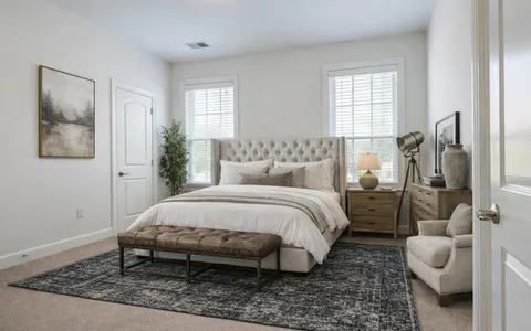 an empty room with closet and windows