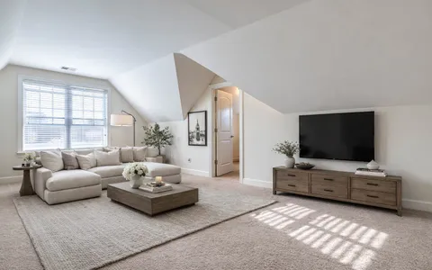 a workspace with furniture and window