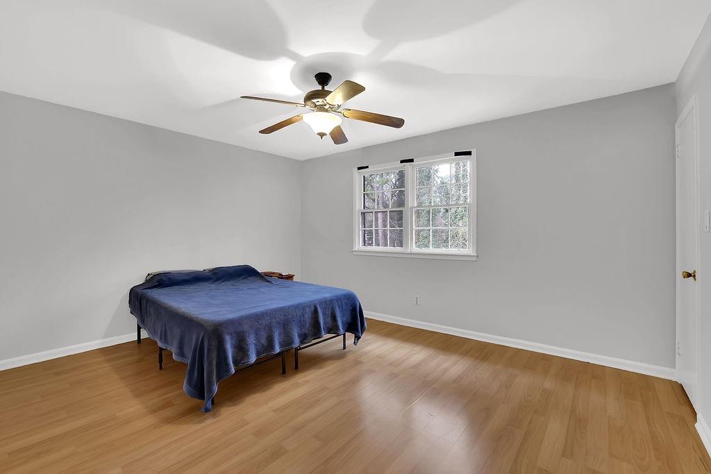 6520 Roswell Road, Unit 62 Atlanta, GA 30328 - Photo 19 of 34 a bedroom with a bed and a window