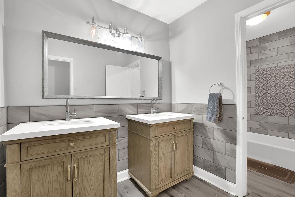6520 Roswell Road, Unit 62 Atlanta, GA 30328 - Photo 23 of 34 a bathroom with a sink and a mirror