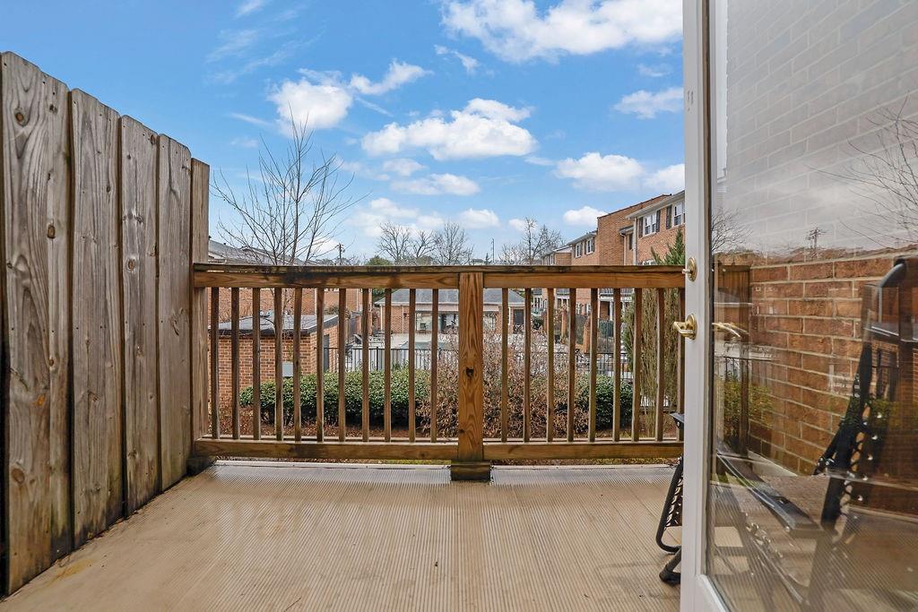 6520 Roswell Road, Unit 62 Atlanta, GA 30328 - Photo 25 of 34 a view of balcony with couch