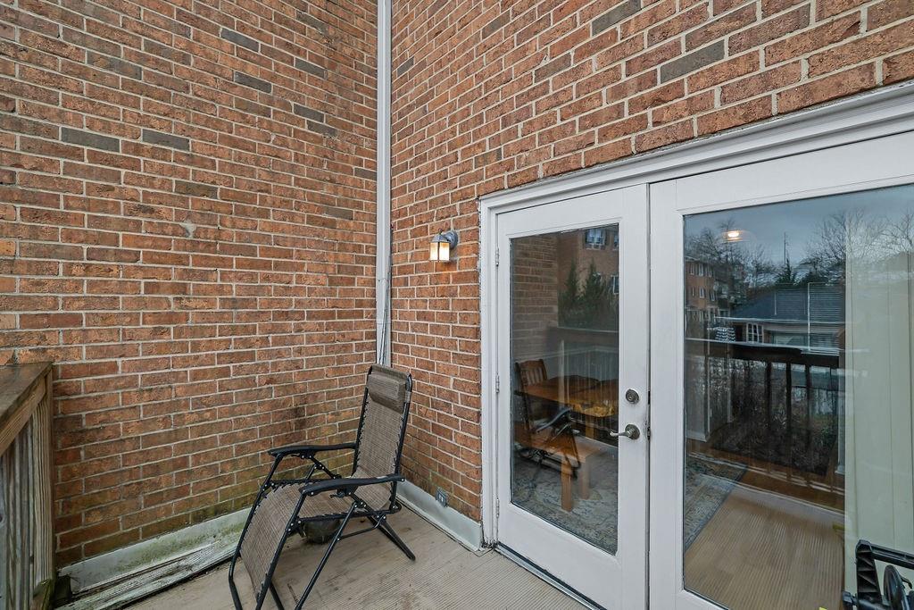 6520 Roswell Road, Unit 62 Atlanta, GA 30328 - Photo 26 of 34 a view of a door and chair in the balcony