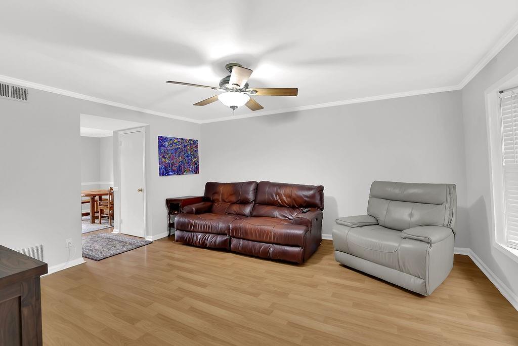 6520 Roswell Road, Unit 62 Atlanta, GA 30328 - Photo 7 of 34 a living room with furniture