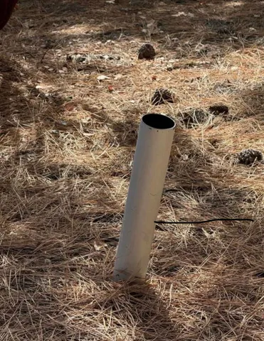 a view of a water heater and a toilet