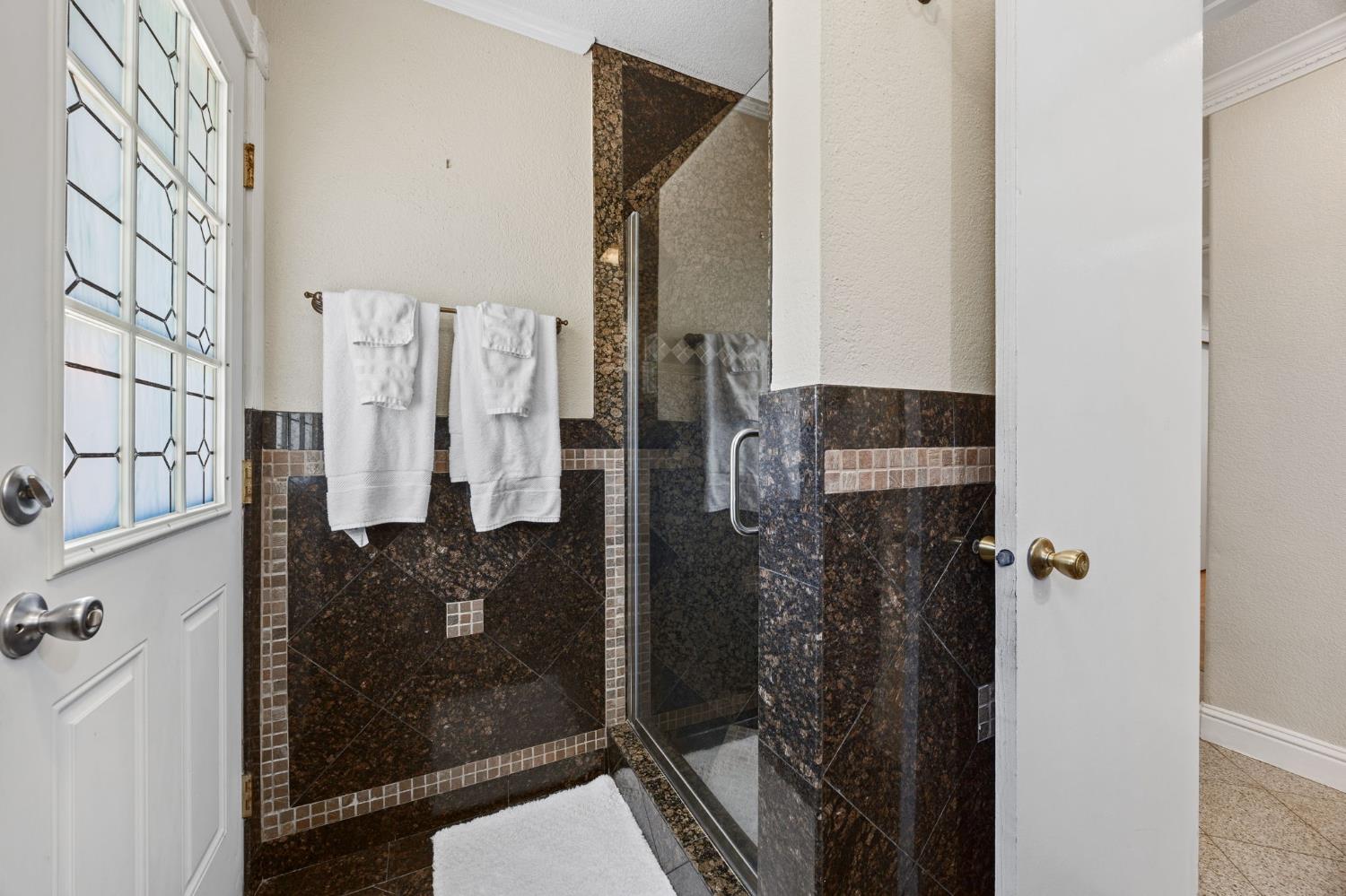 4206 Zephyr Way Sacramento, CA 95821 - Photo 18 of 45 a bathroom with a shower