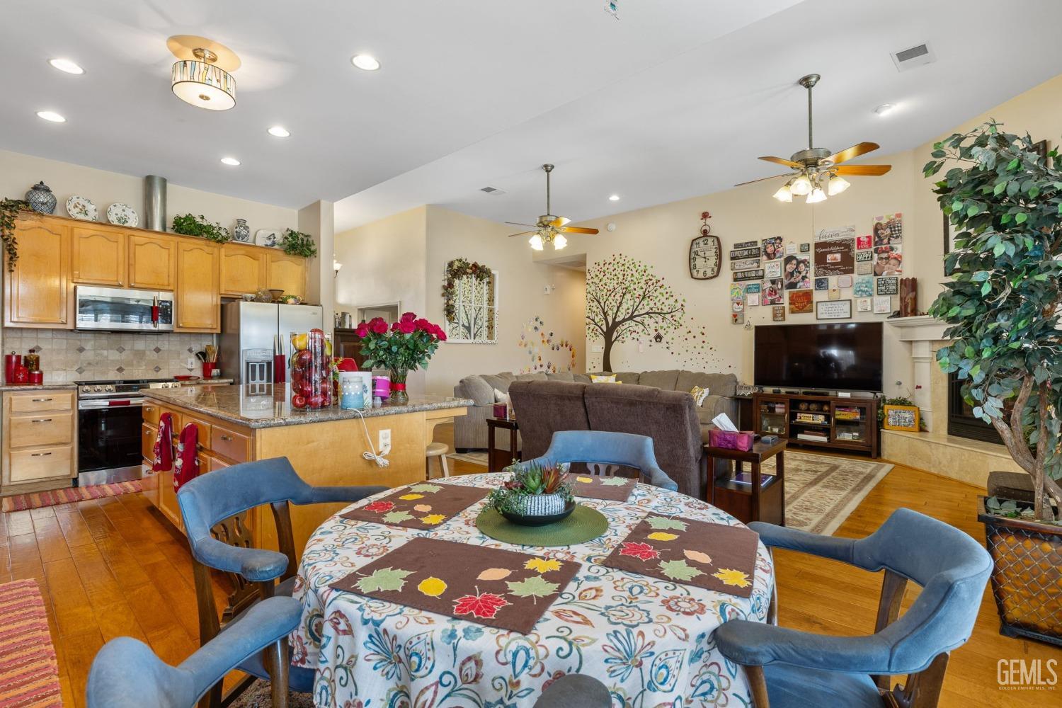Undisclosed Address Bakersfield, CA 93313 - Photo 16 of 49 a view of a dining room with furniture and a kitchen