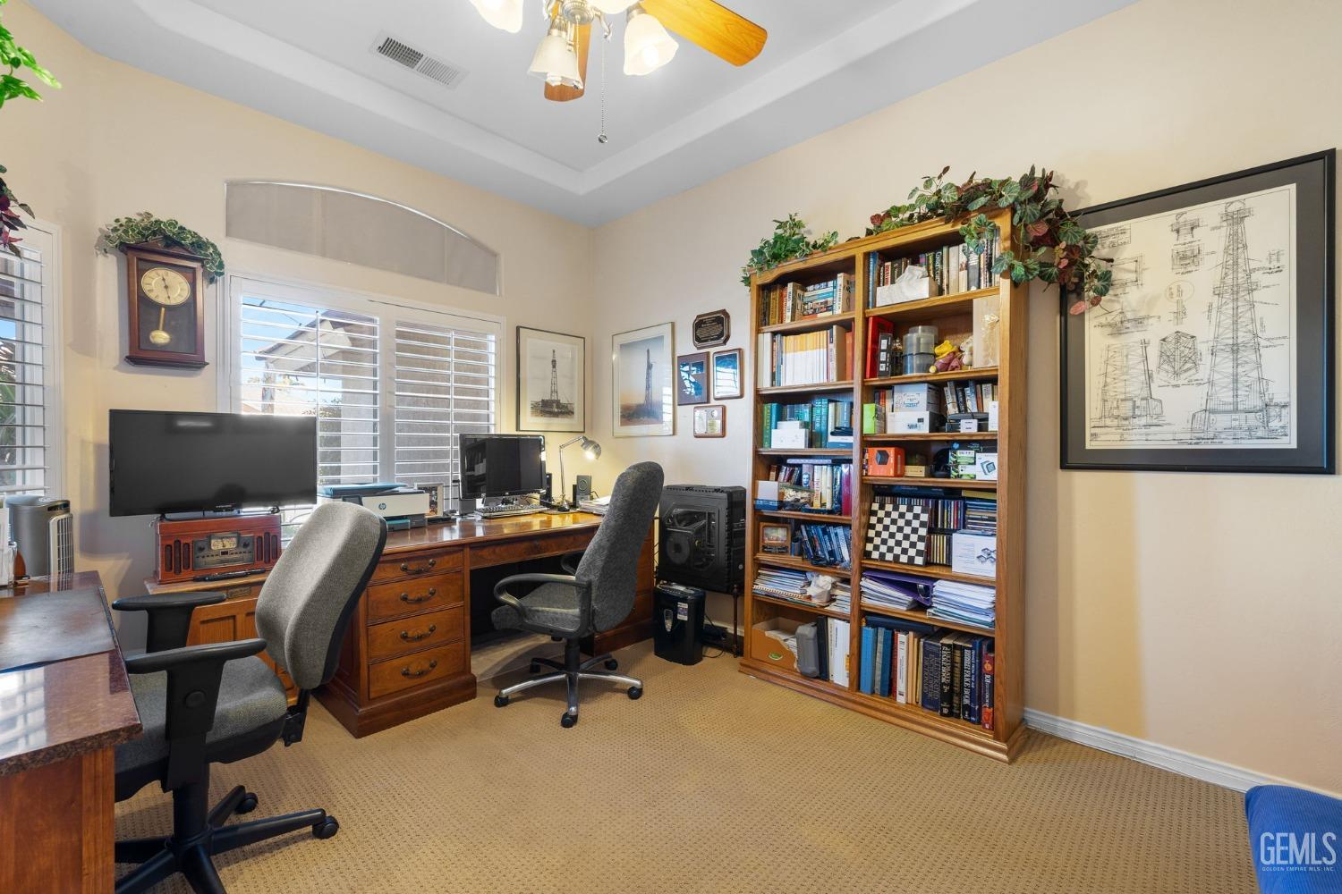 Undisclosed Address Bakersfield, CA 93313 - Photo 24 of 49 a view of a workspace with furniture and a window