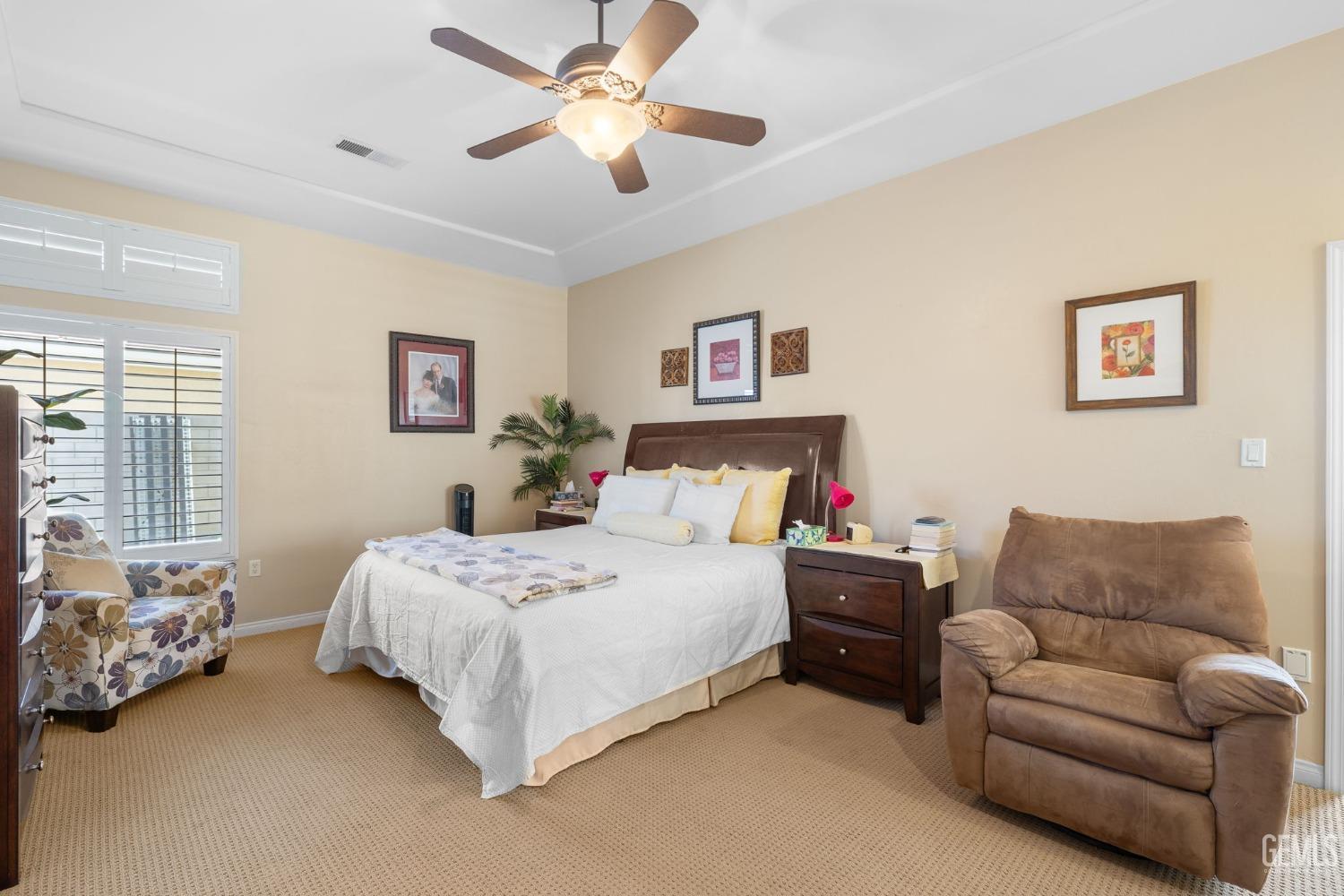 Undisclosed Address Bakersfield, CA 93313 - Photo 26 of 49 a bedroom with a bed couches and a couch