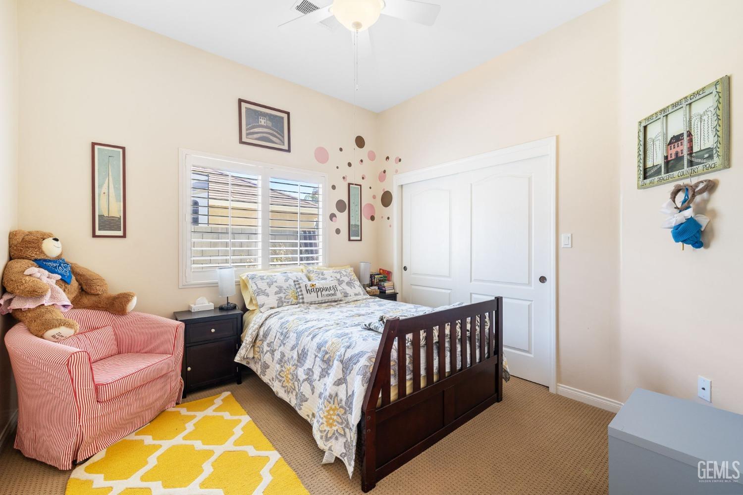 Undisclosed Address Bakersfield, CA 93313 - Photo 33 of 49 a bedroom with a bed and a couch