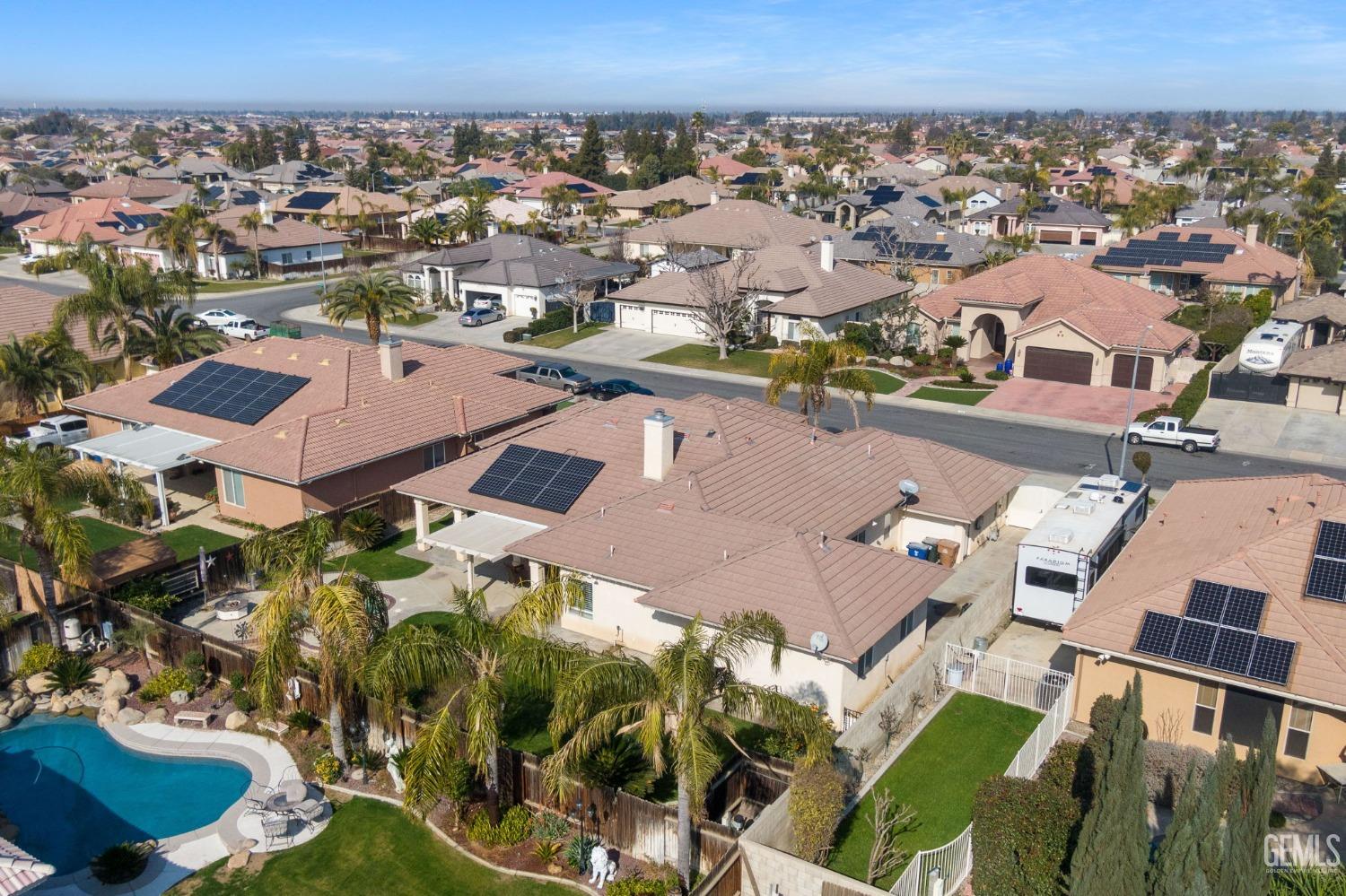 Undisclosed Address Bakersfield, CA 93313 - Photo 46 of 49 an aerial view of a residential houses with yard