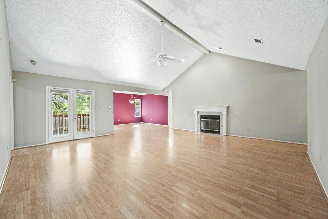 a view of a livingroom with wooden floor