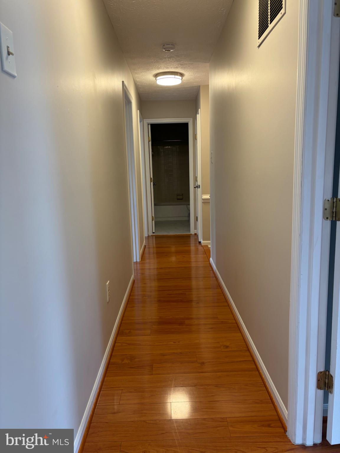 2117 Cross Trails Road Baltimore, MD 21244 - Photo 17 of 30 Inviting hallway with warm tones.