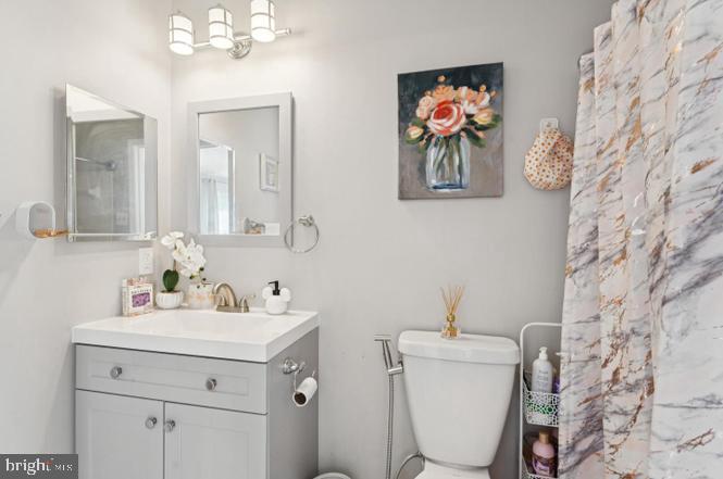 2117 Cross Trails Road Baltimore, MD 21244 - Photo 19 of 30 Charming bathroom with floral accents.