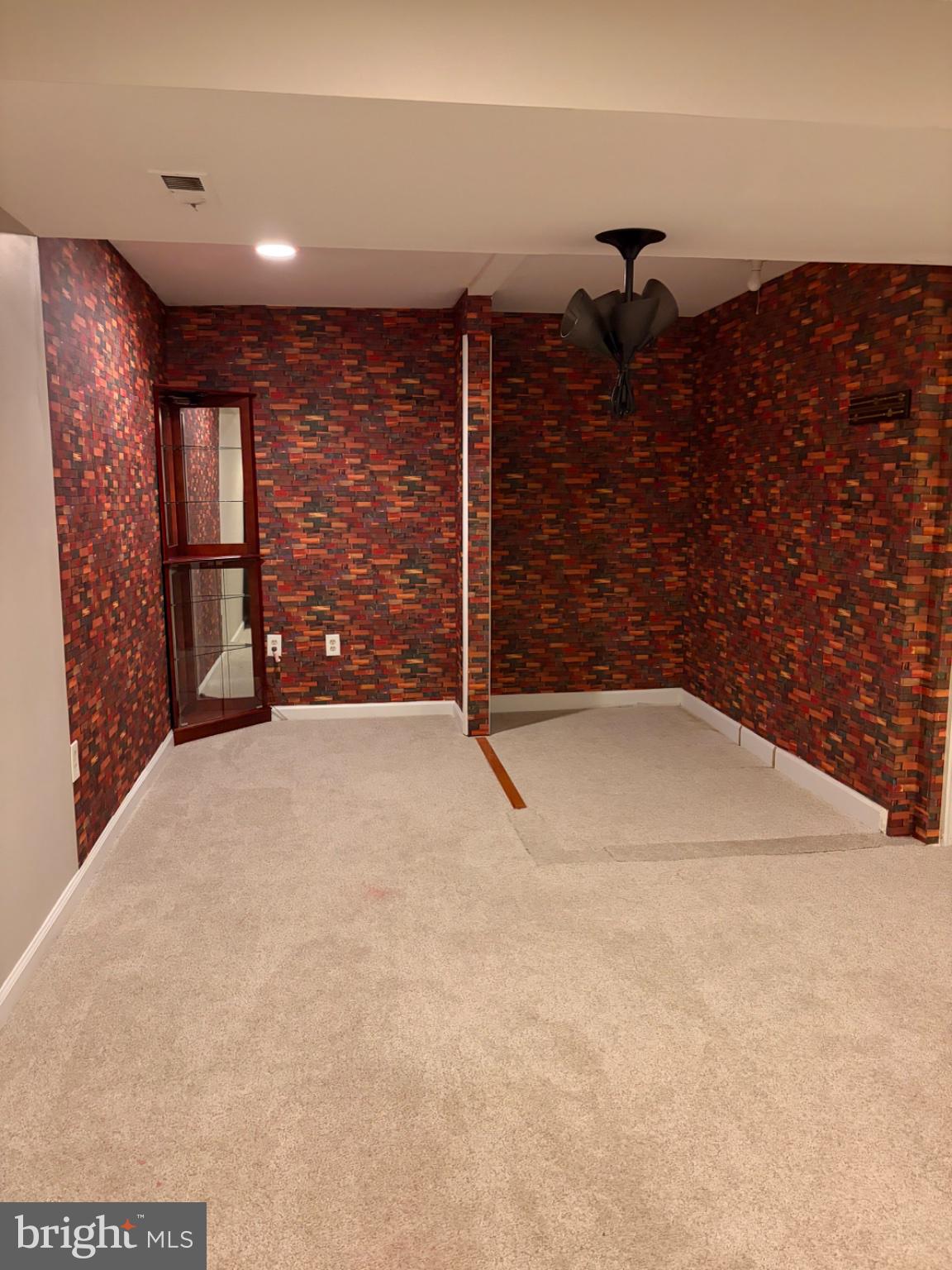 2117 Cross Trails Road Baltimore, MD 21244 - Photo 30 of 30 Vibrant basement retreat awaits creativity.