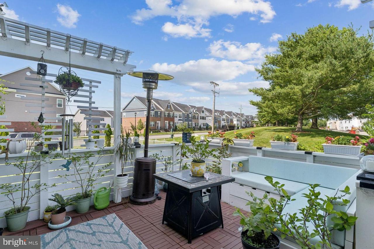2117 Cross Trails Road Baltimore, MD 21244 - Photo 7 of 30 Charming patio with lush greenery.