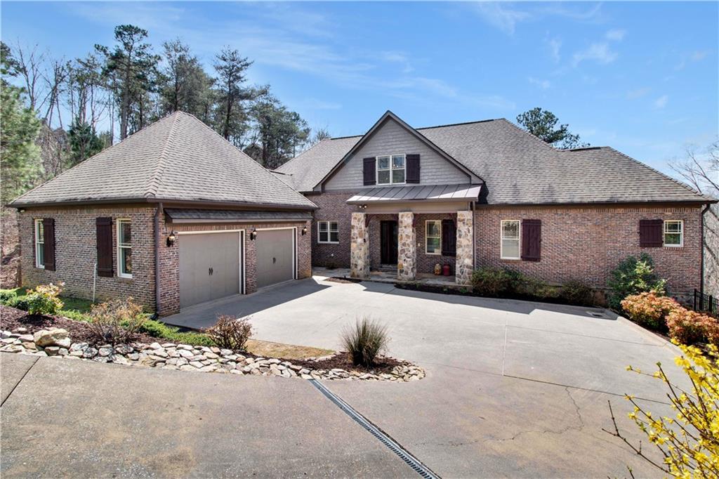 15 York Trace Southeast Cartersville, GA 30121 - Photo 1 of 1 a front view of a house with a yard and garage