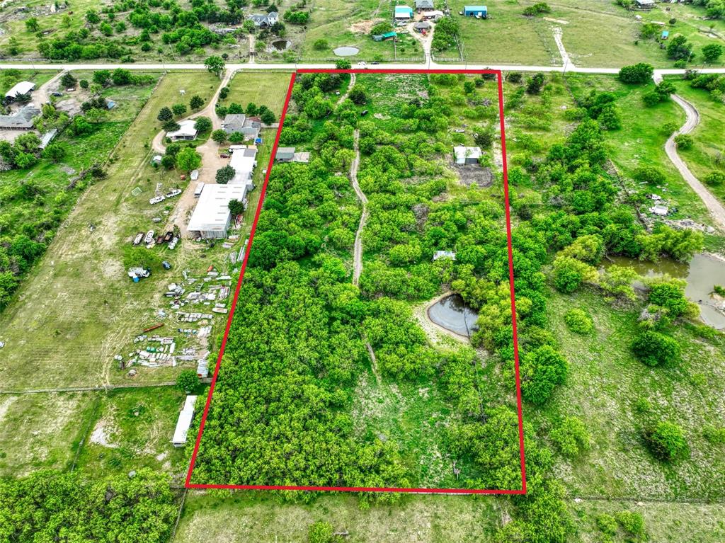 206 185th Rice, TX 75155 - Photo 2 of 23 a view of a garden